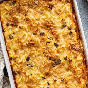 Apple Noodle Kugel is a sweet, baked dish that blends tender egg noodles with apples, cinnamon, and a creamy custard base. Perfect for holidays or family gatherings, it's a comforting mix of sweet and savory flavors.